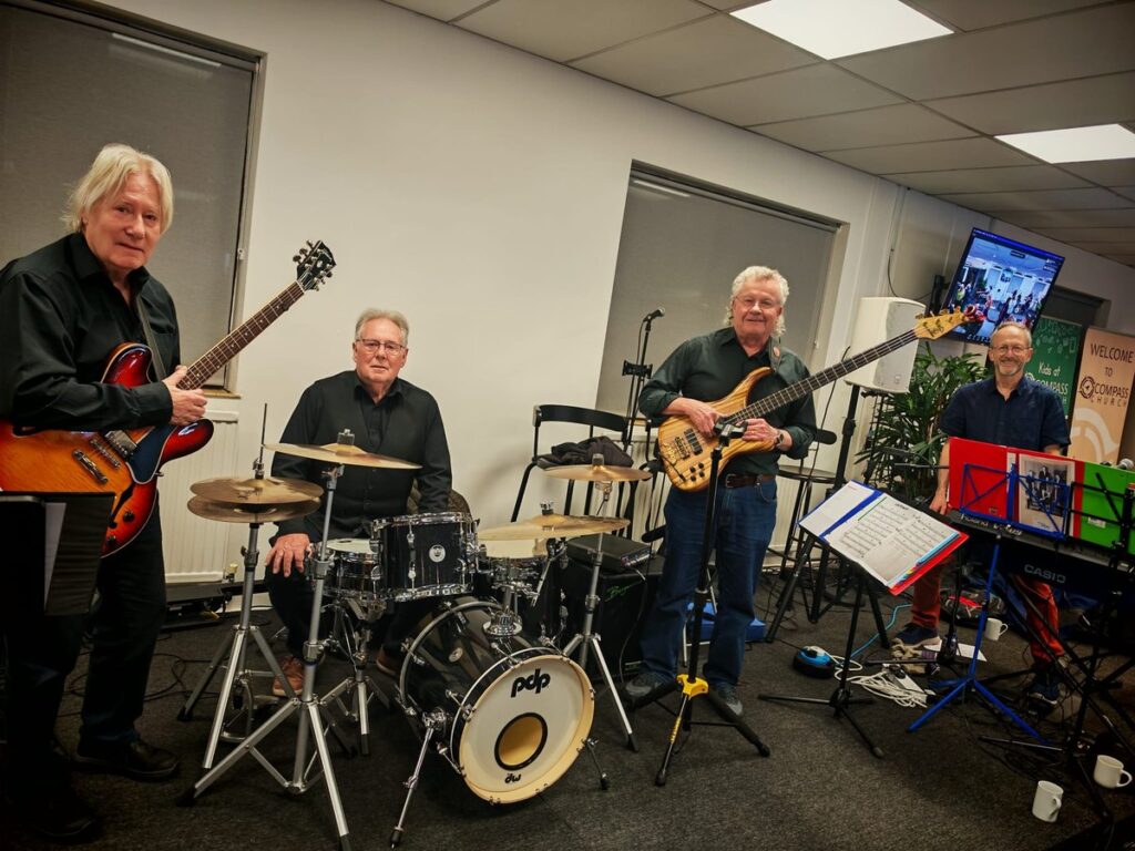 Roy and the Saracens playing guitars and drums at a DSO Thursday morning session