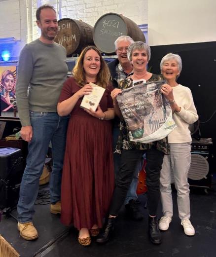 The winning team at the DSO volunteer quiz afternoon holding their prizes